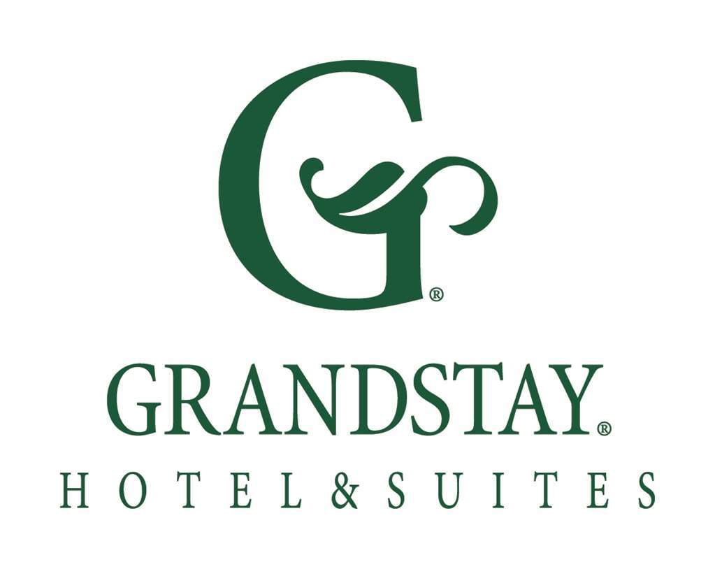 Grandstay Hotel & Suites Of טראוורס סיטי לוגו תמונה